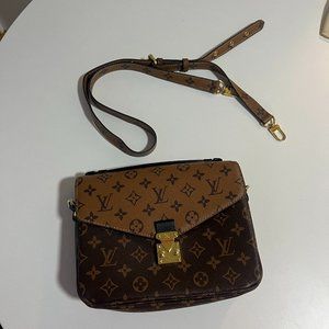 metis pochette Crossbody bag